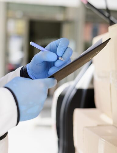 close-up-individual-checking-delivery-list close-up-individual-checking-delivery-list