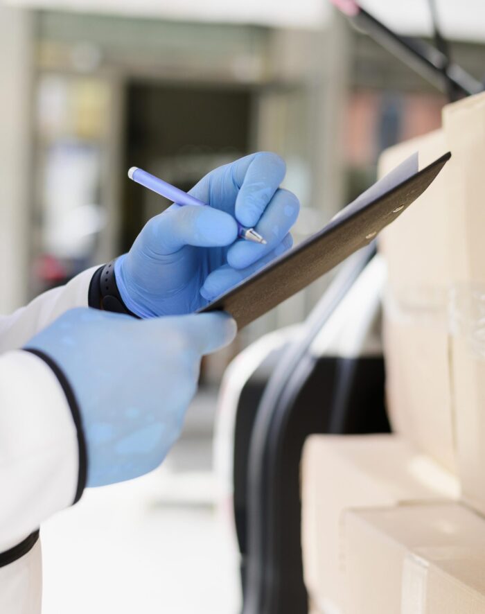 close-up-individual-checking-delivery-list close-up-individual-checking-delivery-list